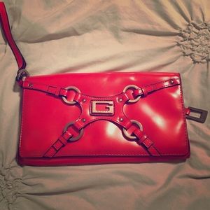 A Radiant Red GUESS Clutch